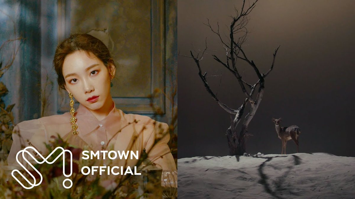 A split SMTOWN Official promotional image showing a woman in a pink blouse with gold earrings on the left, and a deer standing near a leafless tree on a snowy landscape on the right.