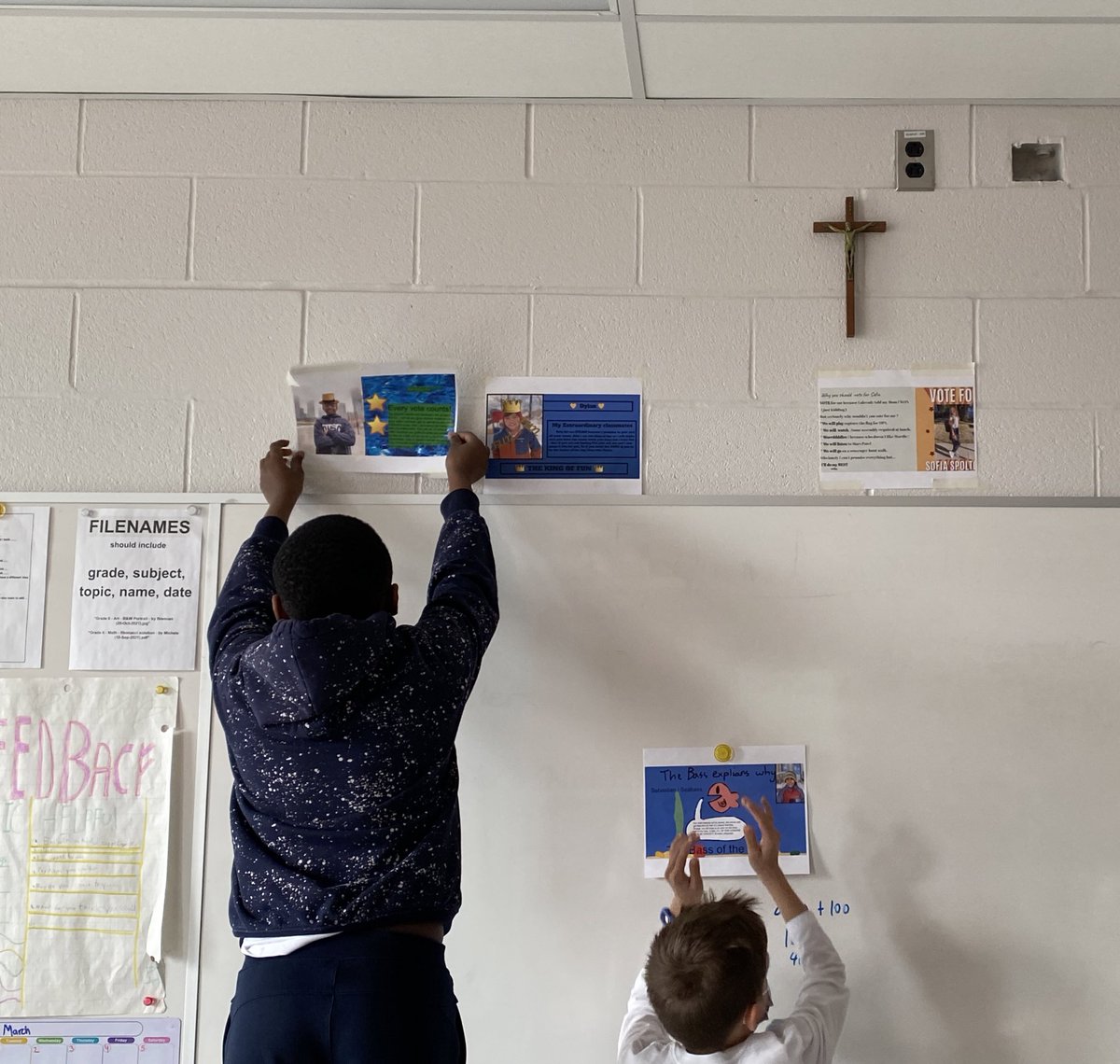 coliveira_02's tweet photo. Leader for the Day! Today students put up posters and had rallies, explaining why they would be the most fit to be the leader of our classroom for a day. Tomorrow we will begin our debates! Friday will be Election Day! @BishopMacTCDSB @GraceDECE https://t.co/6JR9IBfrxD
