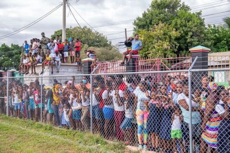 chrisshipitv's tweet photo. Can we insert some sense (and facts) into this fence photo in Trench Town?
There was a fence around the football pitch
People gathered to watch the match with @sterling7
William and Kate went to say hello
Just as they also said hello to crowds in the street
End of story. Move on https://t.co/Zw8DXf9F7Z