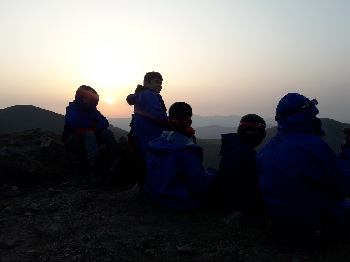 Year 8 boys from <a href="/BoltonSch/">Bolton School</a> broadcasting live from the summit of Catsycam 890 metres above sea level,as the sun sets over the Lake District... Adventure Learning at <a href="/Patterdale_Hall/">Patterdale Hall</a> .