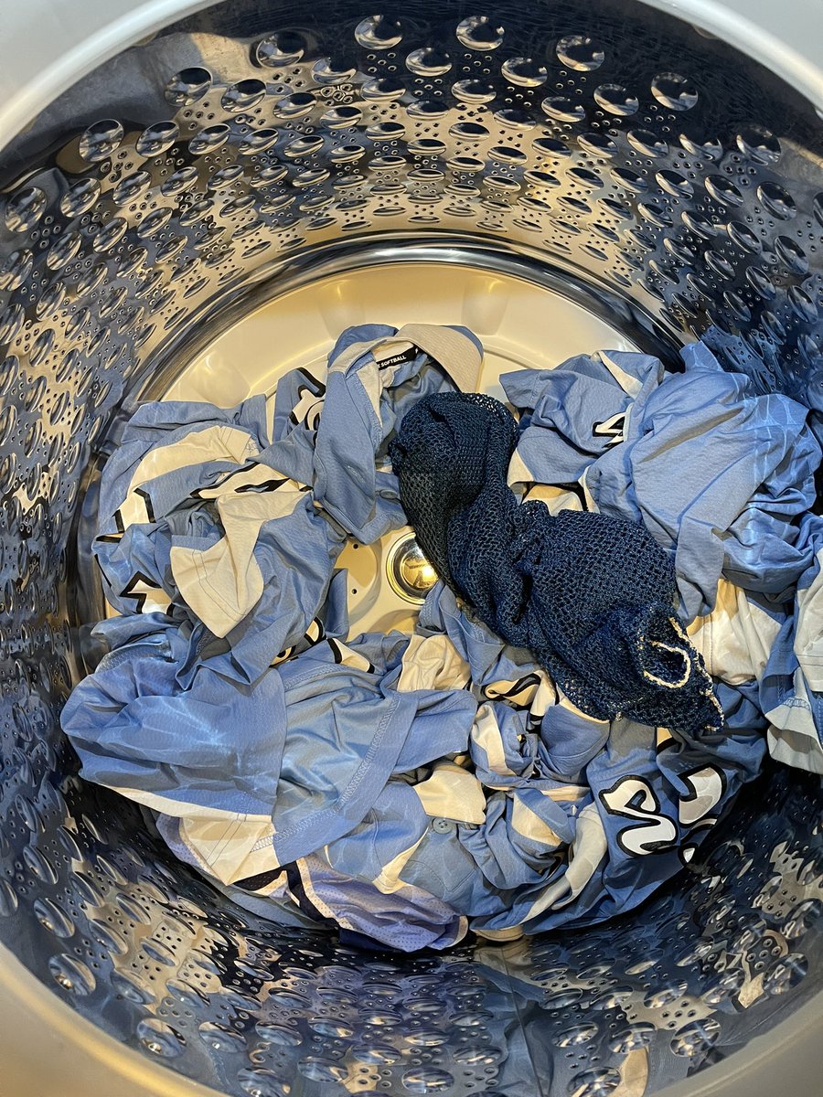 Doing a load of uniforms tonight and my son asked me if my new favorite color was blue because “I have a LOT of blue shirts.” 😂 #softballcoach #laundryday