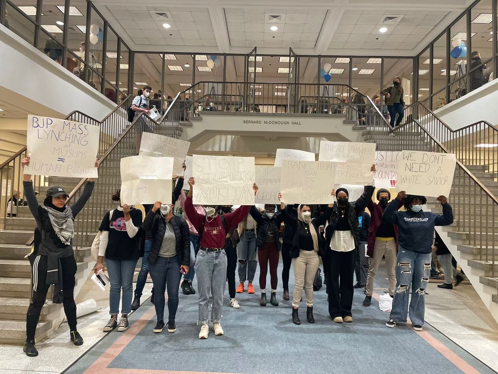 Georgetownmlsa's tweet photo. Today dozens of @GeorgetownLaw students stood against @SusanDellerRoss’s Islamophobic &amp; racist behavior during a clinic fair advertising the International Women's Human Rights Clinic. 1/4

#IslamophobiaAtGeorgetown #TakeActionDeanTreanor #TossRoss https://t.co/lp0Yao0Wsw