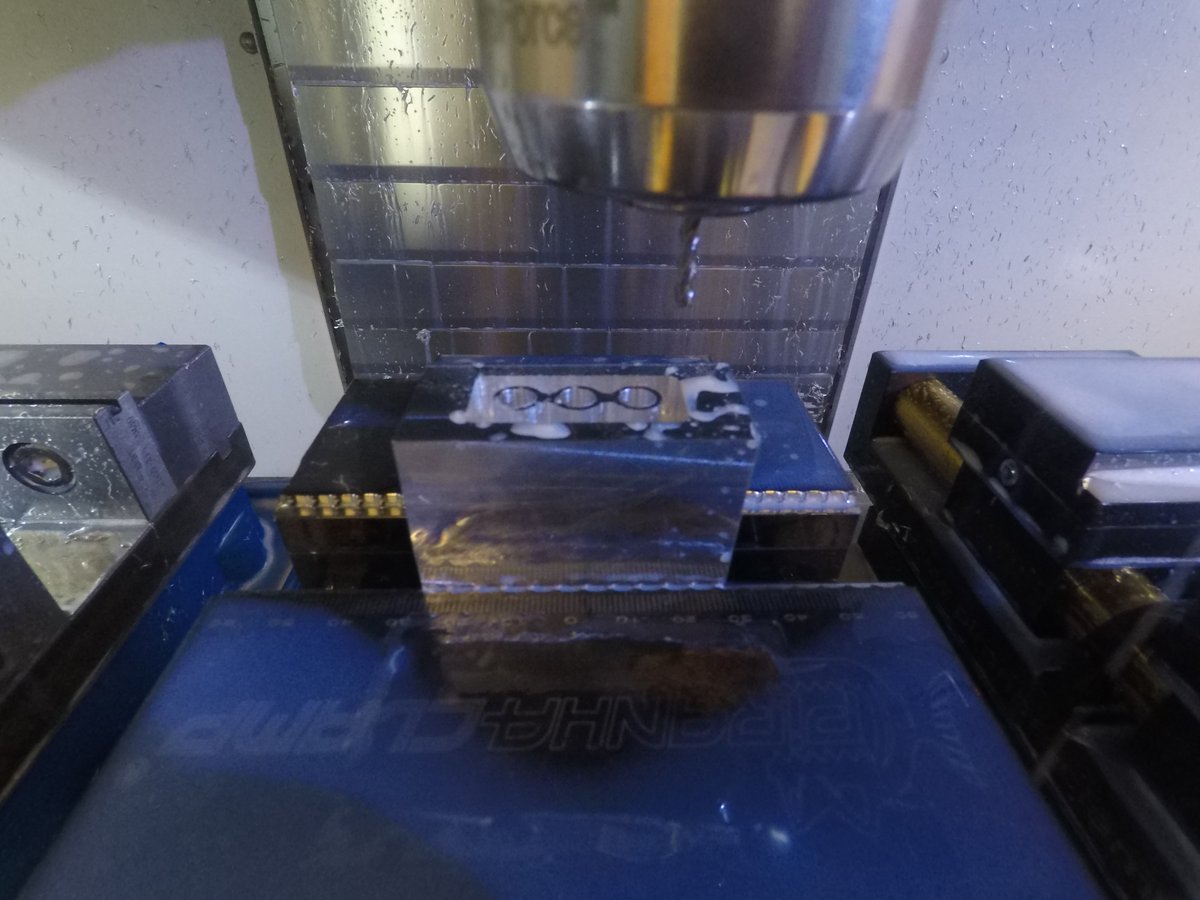 PurdueBechtel's tweet photo. Take a look at the center's training program for CNC manufacturing in @Haas_Automation's Gene Haas Manufacturing Lab
For this training, we are manufacturing a LEGO block out of aluminum with a logo of @purdue_seds  embossed on it. https://t.co/tjqDzbozIt
