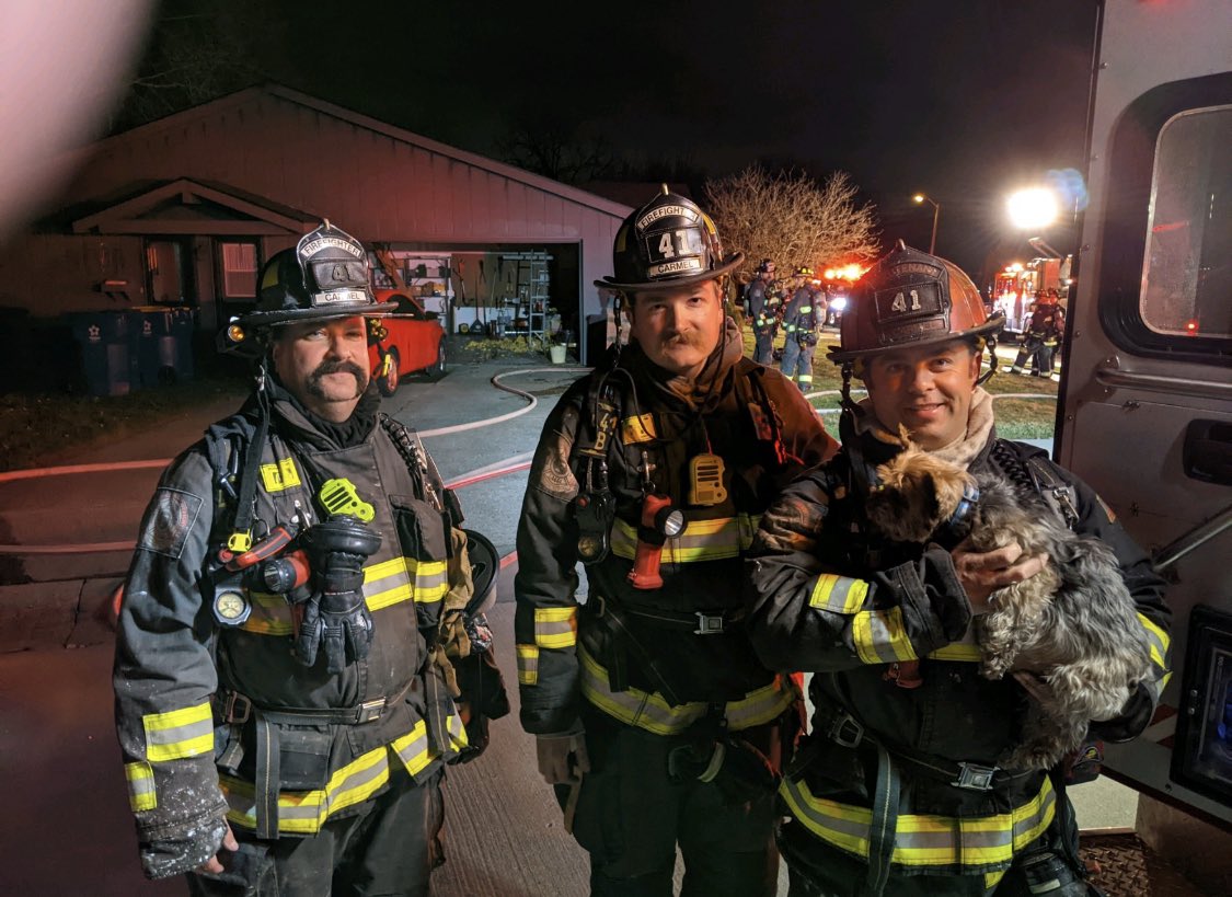 CFD911runs's tweet image. L346 with Ace the dog after pulling him safely out of the fire and is reunited with his owner and is being evaluated in M346