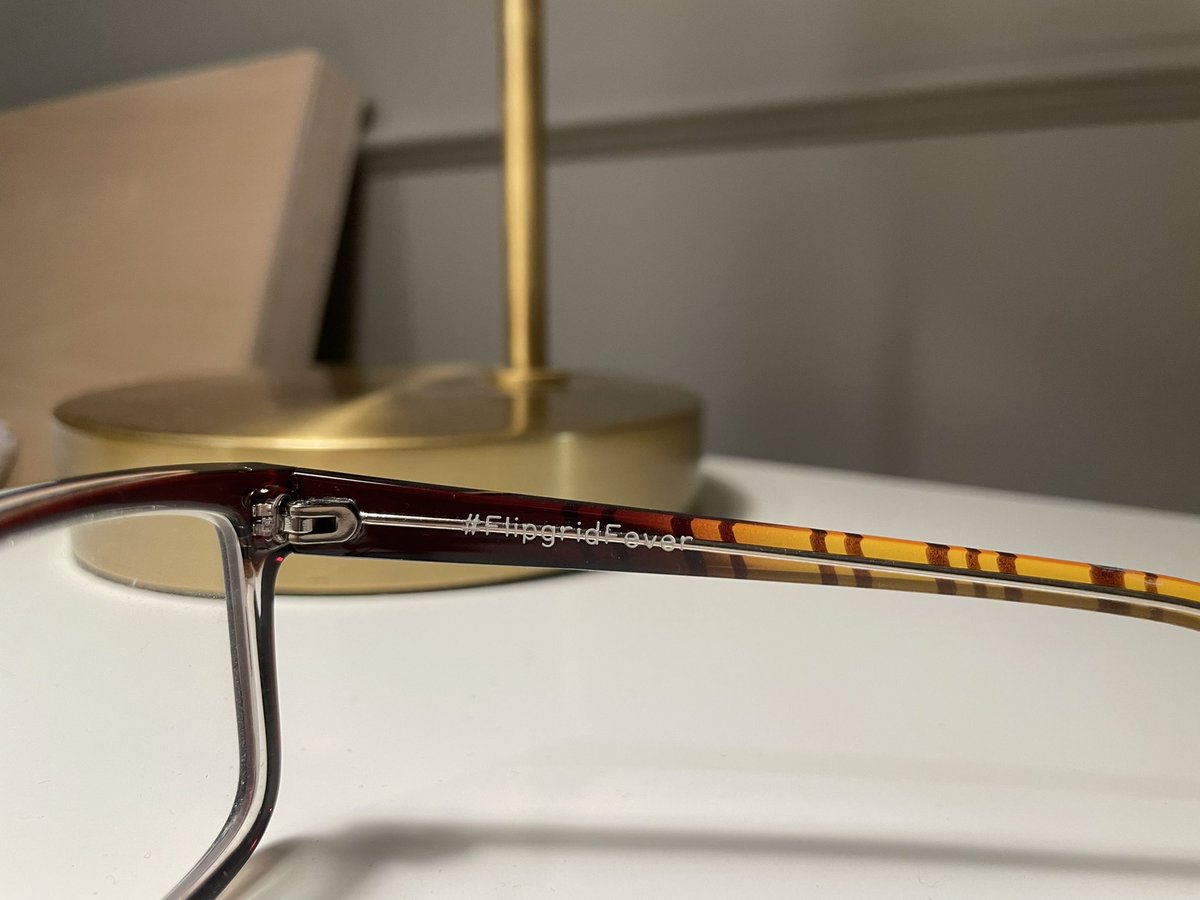 Taralson's tweet image. Throwback to the time I got #FlipgridFever etched on my glasses