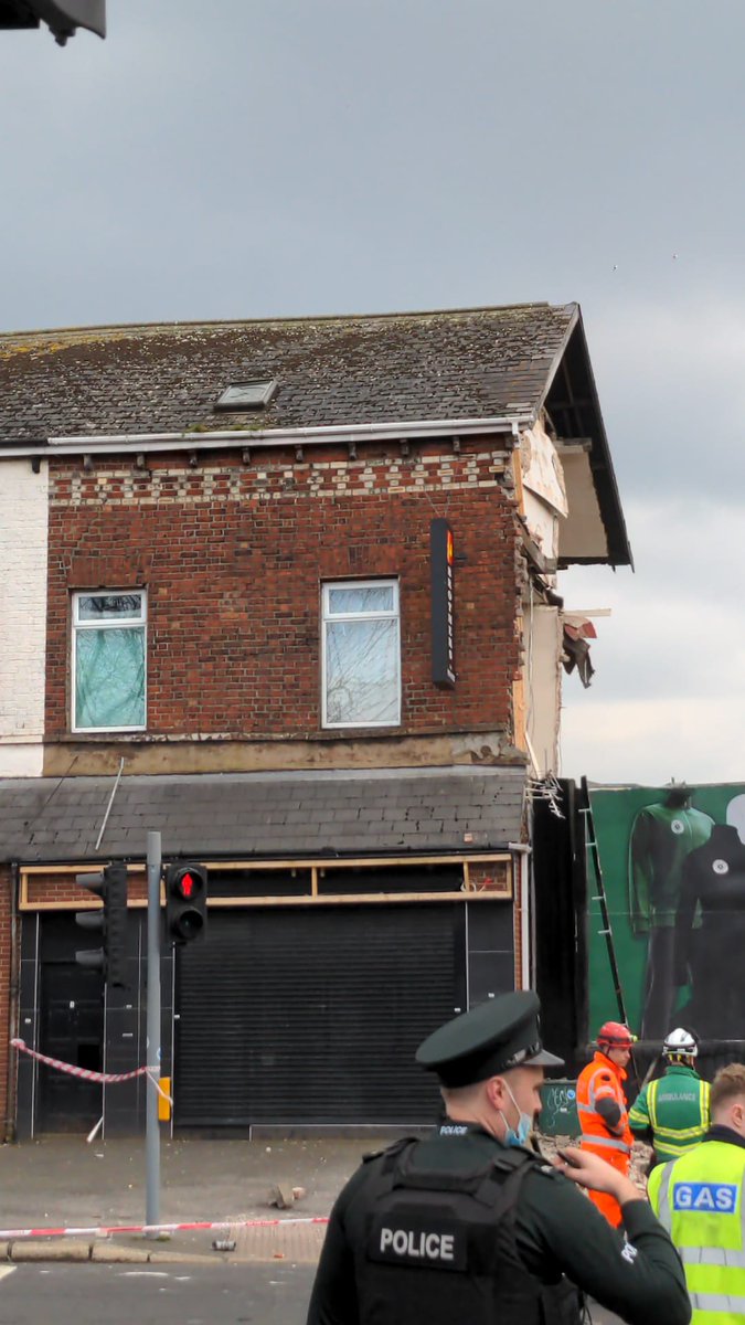 Harry_McCathie's tweet photo. Gable wall of a Chinese takeaway has collapse on the Antrim Road at the junction between Limestone Road and Cavehill Road. https://t.co/NL5EHMdNoy