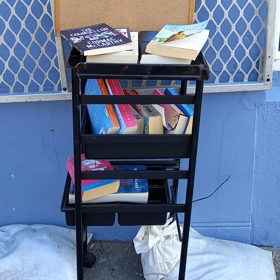 TramoreEcoGroup's tweet photo. Fantastic to see one of our local hairdressers Marcella's Unisex Hair Salon helping our environment When you have your hair cut you bring home your clothes protector and bring it back with you for your next hair cut. Free books outside to take home for those passing by. #Reuce 🌎 https://t.co/ewbgxb100M