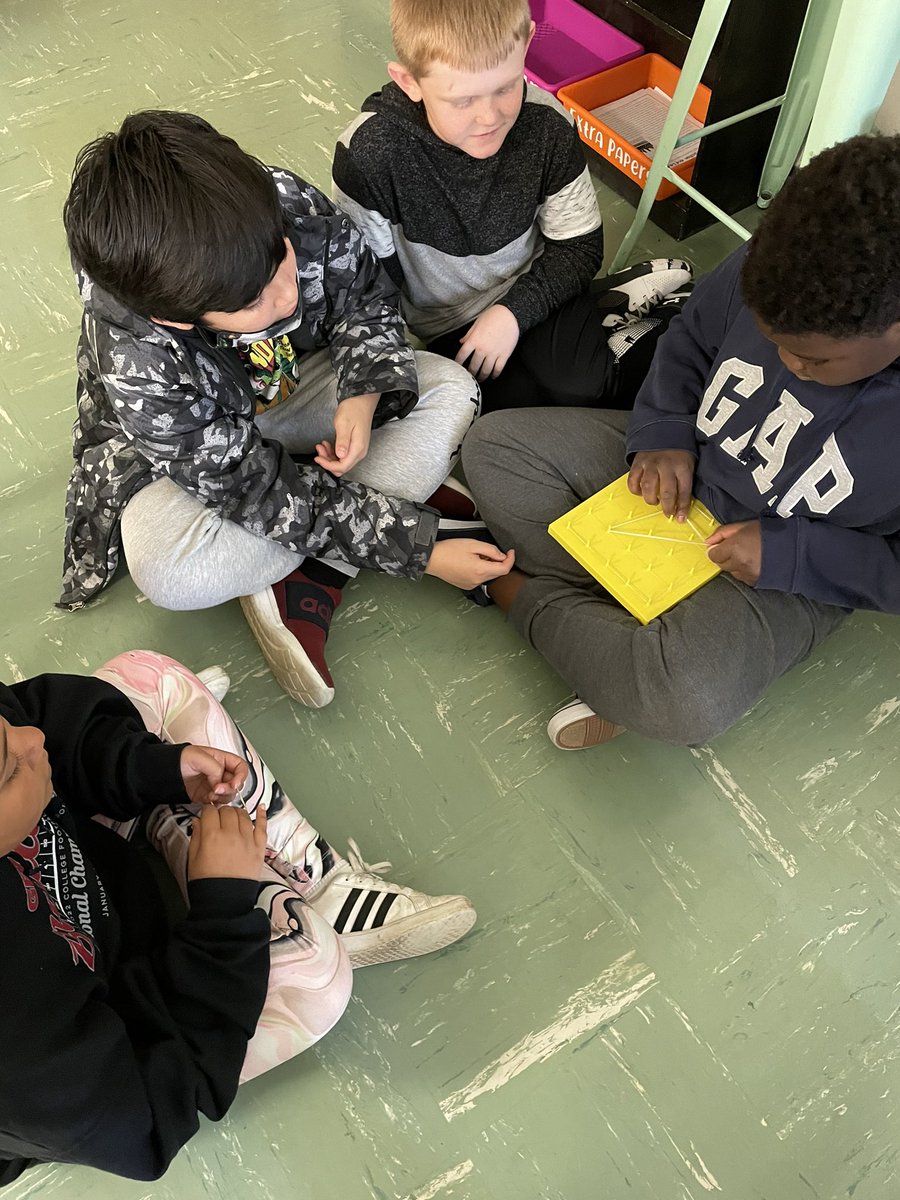 BogaardsNHE's tweet photo. We are using our geoboards today to determine lines of symmetry for polygons! @NHE_HCS https://t.co/9zFCIra90x