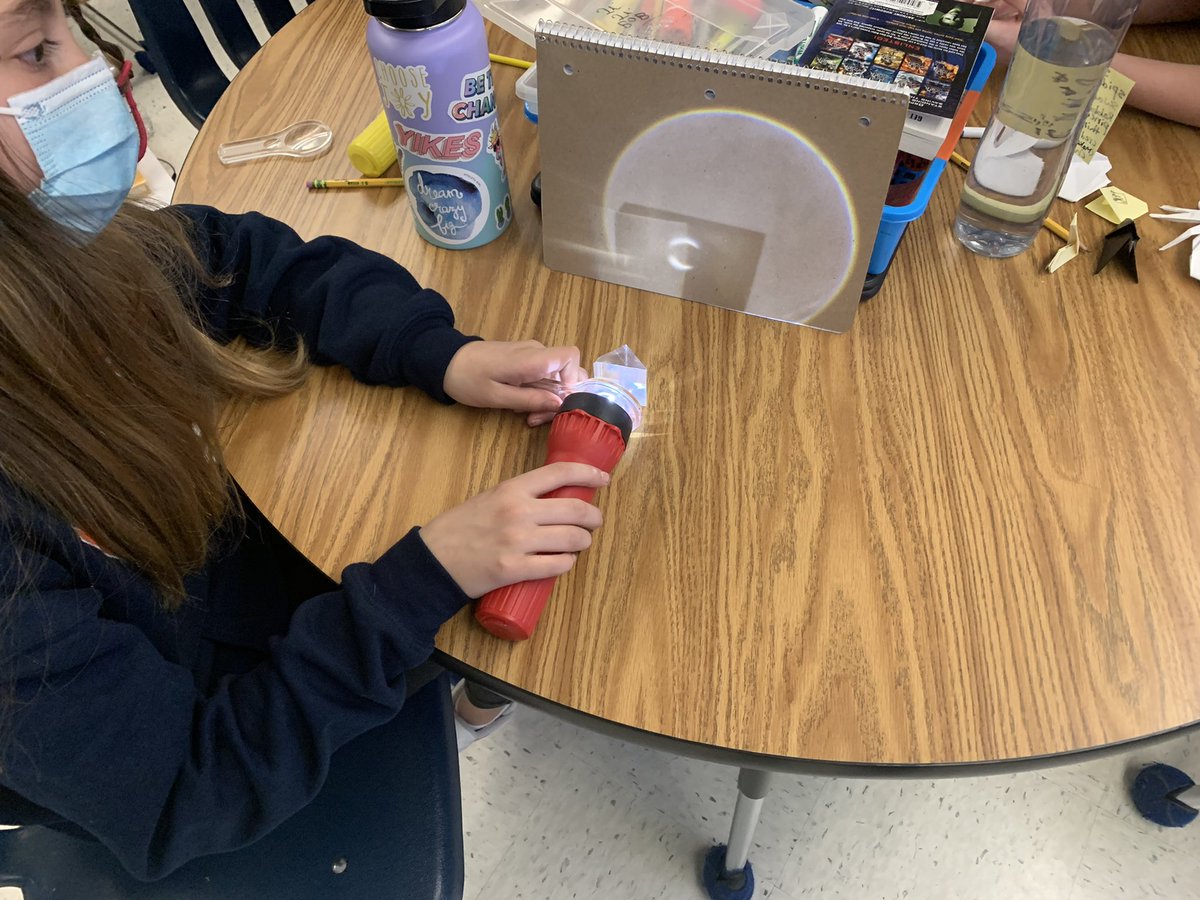 CPES5thGrade's tweet photo. 5th graders experimenting with prisms and making rainbows #cpesbelieves https://t.co/lX34wAg5rn