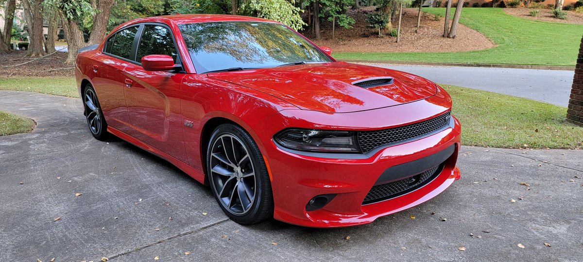PerceptiveTiger's tweet photo. @Dodge My Scat Pack is red. Everywhere I go strangers tell me how great it looks. https://t.co/pg9ZiJmkz6