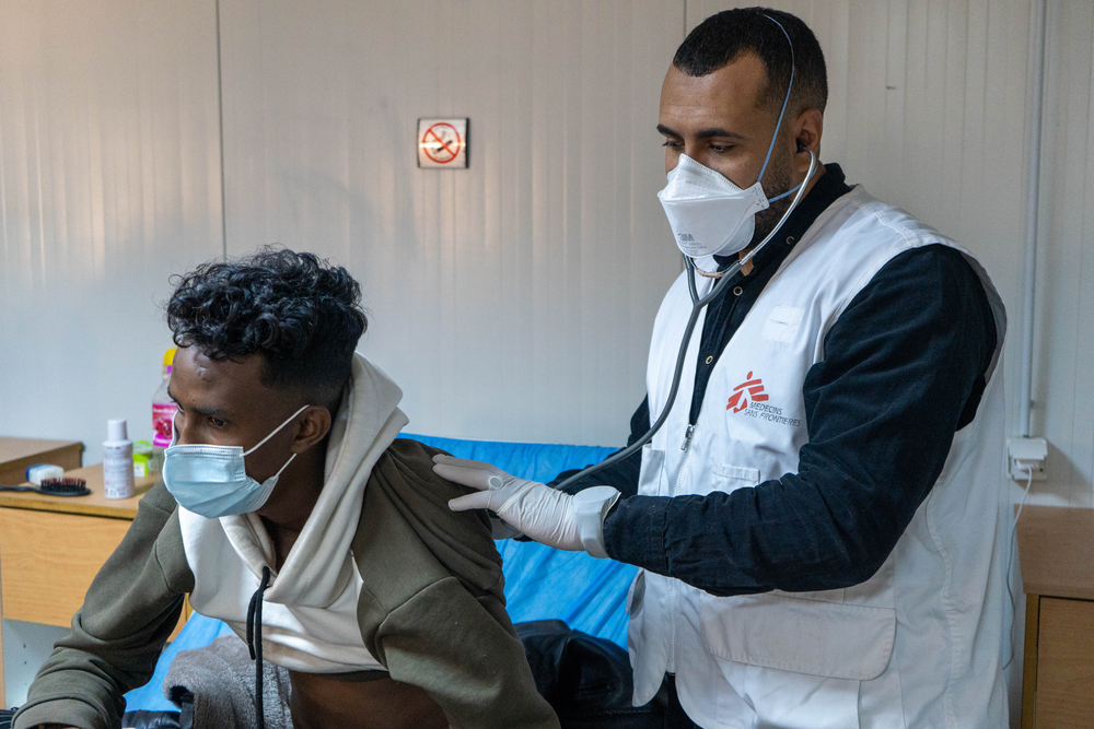 Dr Abdu Samya Bashagha checking on a patient in Abu Sitta Hospital where MSF is running TB support activities. Photo: Omar Rashid/MSF