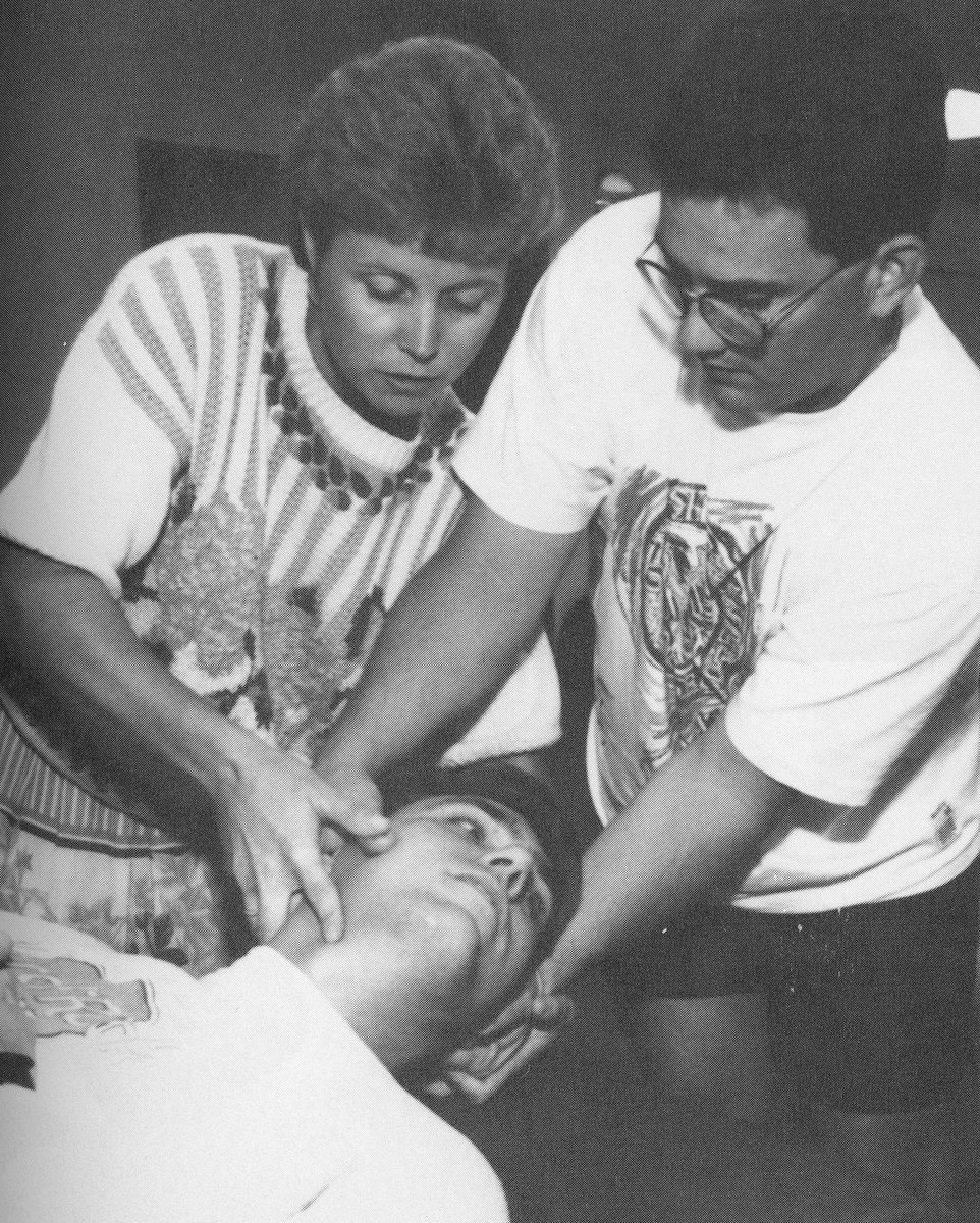 It's #TBT time! OMM is an important part of the DO curriculum and in this yearbook photo from 1995, Dr. Robin Dyer assures Scot Robertson that David Thompson’s neck is not going to be hurt after this maneuver.