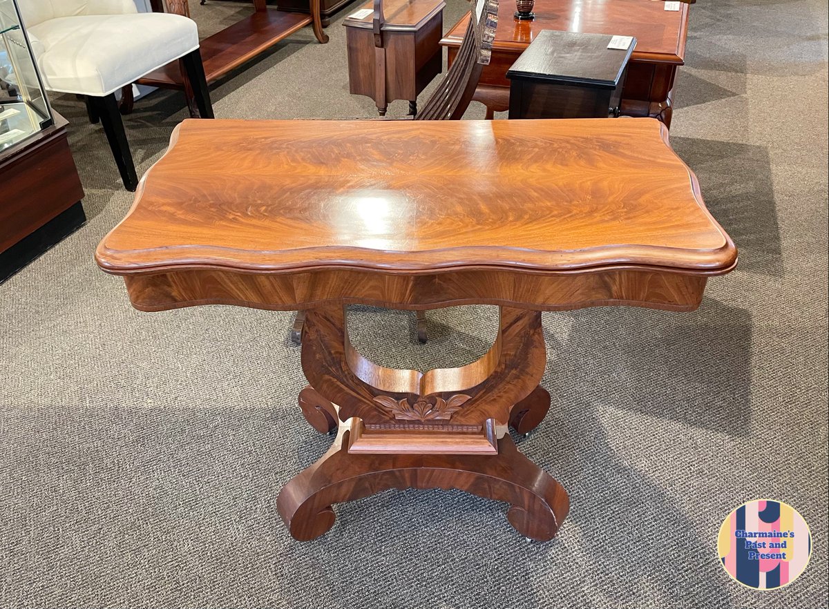 charmainesVic's tweet photo. A marvelous piece for a small space, this mahogany table's top swivels to reveal a handy little storage compartment and folds out into a surface that is perfect for an intimate meal or friendly game of cards! 
See more on our website: 
https://t.co/AJNUnsqleU

#charmaines https://t.co/4qozJKTGWv