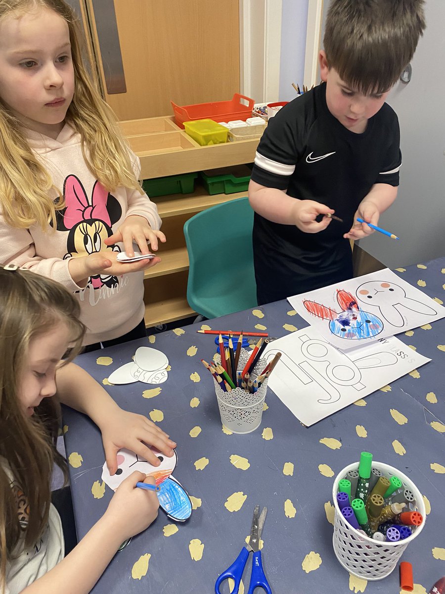 F and K having cake for tea.
K, M and J experimenting with the ramp.
H enjoying the play dough.
A, M and L making bunny masks.