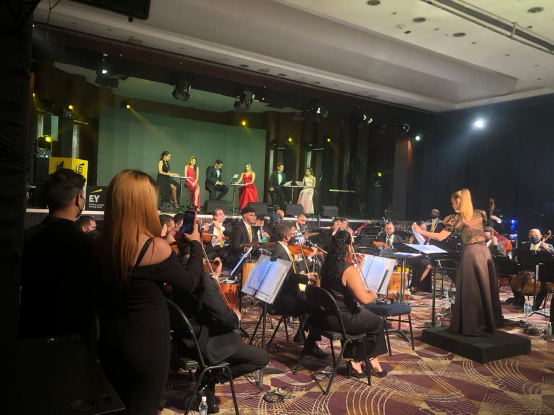 EY_Venezuela's tweet photo. Comienza la 8va edición de Reconocimiento de los Líderes Empresariales Inspiradores con la participación especial de la Orquesta @AyacuchoSonando, bajo la dirección de @elisavegas #EventoLEI #ExperienciaLEI https://t.co/mFeDfcrJt0