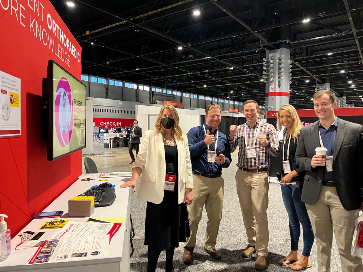 AAOS1's tweet photo. #OrthoResidents from the Naval Medical Center in San Diego visited the ROCK booth at the #AAOS2022 Resource Center. They answered quiz questions from the program and scored gift cards to Starbucks and Amazon! Learn more about the ROCK here: https://t.co/n7GushoIx5 #KnowledgeROCKS https://t.co/o0JfVXCQeW