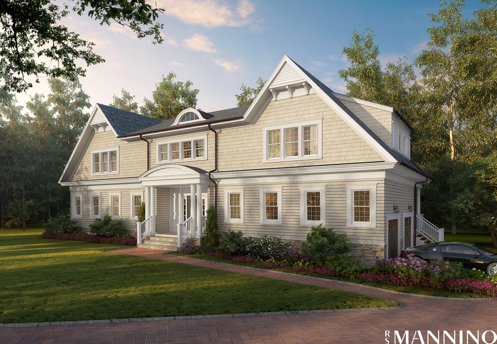 Symmetrical elongated gables flank the eyebrow dormer creating a prominent facade and a sense of understated elegance.  Our version of a classic shingle-style.