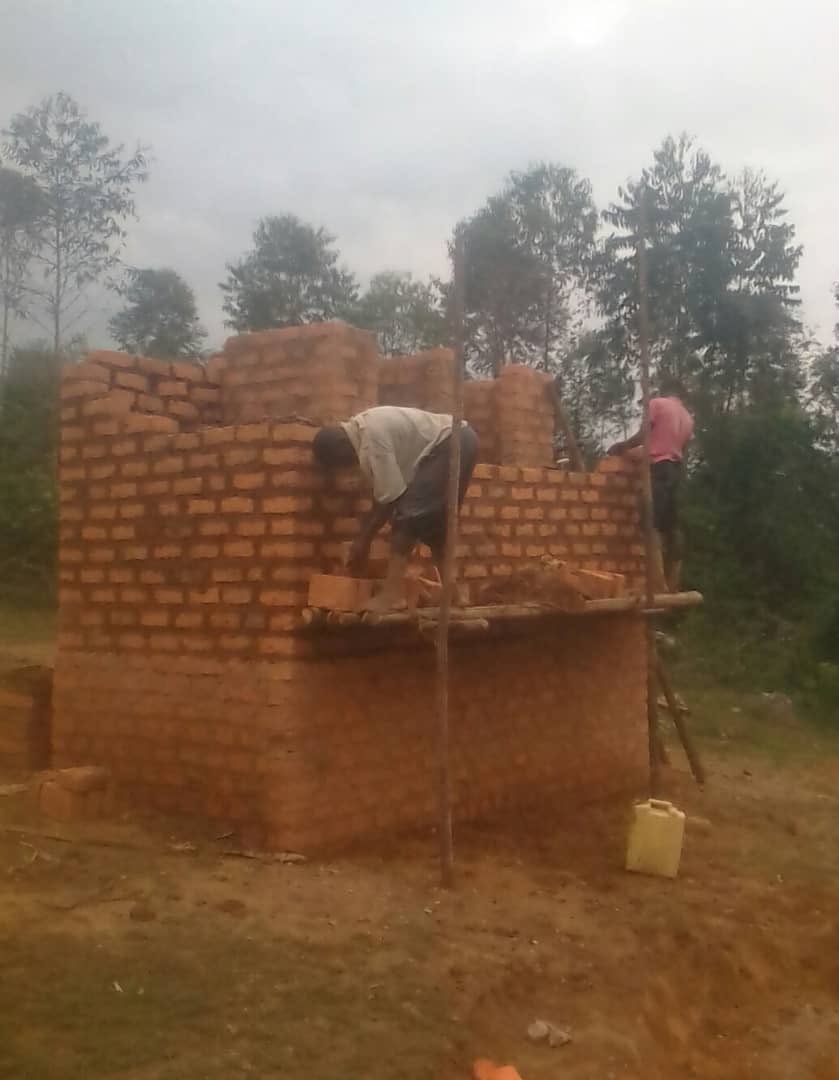 UgSchoolProject's tweet photo. Last year I worked with my British friend Char and we managed to raise enough money to build two new latrines at the school. Vital for hygiene and good health for students and teachers. https://t.co/D9QcxPBQm1