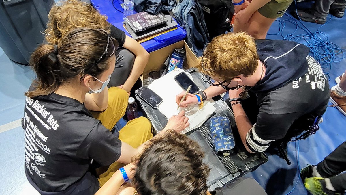 RoboRockinBots's tweet photo. "Do the math; save the world." Team 2035ers solve a complex physics problem collaboratively to improve our shooter. Thx David. @FIRSTinCA #MarkLeon #Team2035 @PadreBobCHS https://t.co/ykb11oJit4