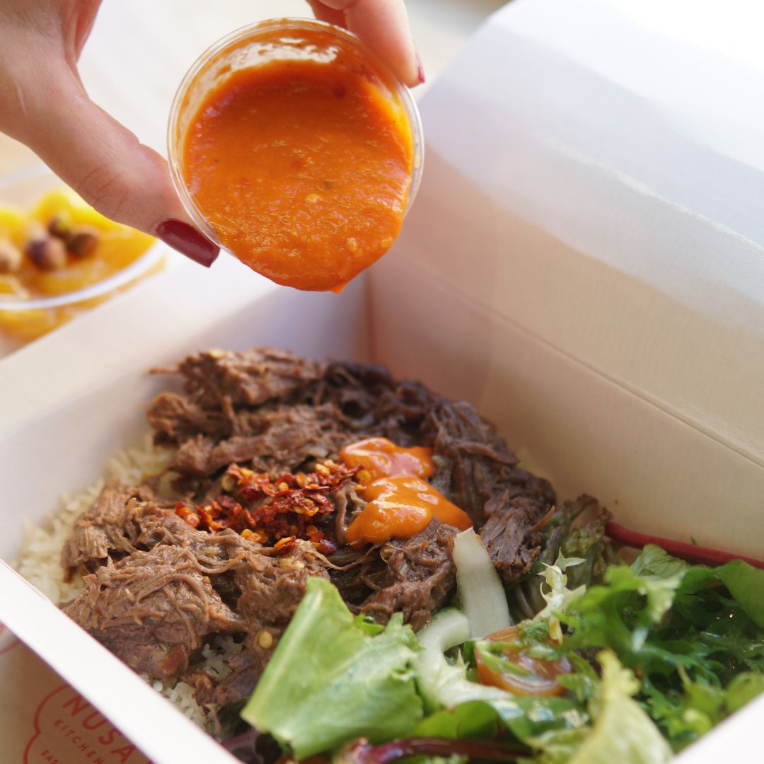 Who's tried our Malay Beef Rendang yet? 🍲

Asian style slow cooked beef bavette served on coconut rice with mixed leave salad and side of chilli sambal dressign. 🥩🍚

Freshly made with natural ingredients in Nusa Kitchen every day.👩‍🍳

#eatlondon #londonfood