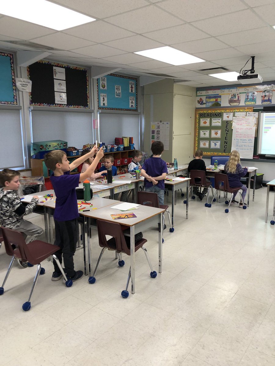 ErinGagner's tweet photo. It’s a great Friday in my Grade 1/2 class at King George as our Math Coach Mrs. Fraleigh explores making ten trains using cuisenaire rods. @LeslieLlockett @lkdsb @LKelempro @93duker9 https://t.co/wa7FTRxTa2