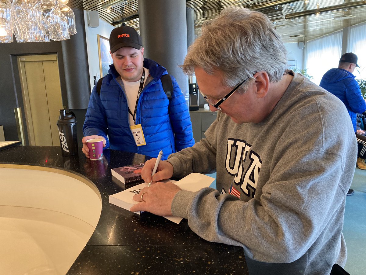 USAwbandy's tweet photo. USA coach signing his Bandy Chronicles for Finnish coach topi rytkonen https://t.co/q9lEj0jYEL