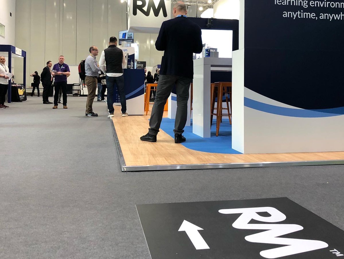 RM__Technology's tweet photo. Day 3 of the @Bett_show is well underway, with a nice buzz on the stand (SN21, near entrance S4). How can RM support your #edtech needs? Swing by our stand and let’s talk. From connectivity to MIS, hardware and managed services, we have it all. See you soon.#RMatBett https://t.co/P55rAAuxNa