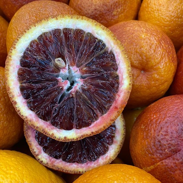 Peak citrus season is nearing its end which means we’ve had many varieties in our boxes lately. These blood oranges are a show stopper! Compared to regular oranges, they taste less acidic, slightly sweeter, and have hints of raspberry or strawberry flavor.