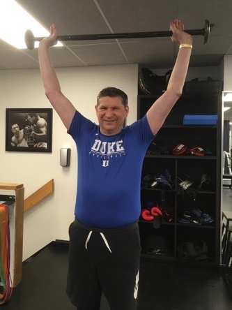 TomsPlaceTO's tweet photo. Lookout all you heavyweights! #Duke Rules! Great win yesterday for #CoachK  Tom’s Polish brother! And if you noticed, yes that is #Chuvalo &amp; #Ali duking it out in the photo behind Tom! #GoDukeGo https://t.co/VBqABia6nQ