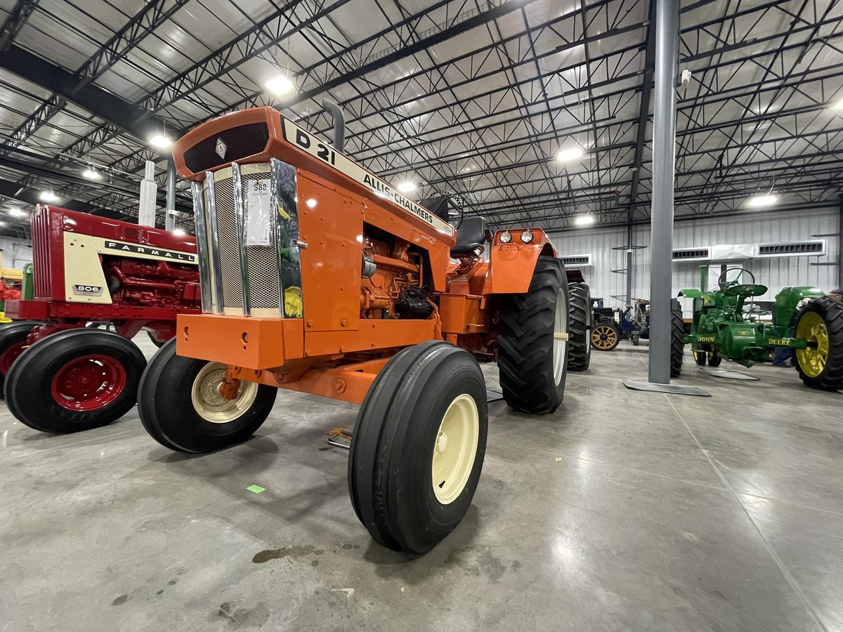 TractorZoom's tweet photo. Stick around. More from the Mecum Gone Farmin’ auction soon! (Yep, that’s a Lamborghini crawler there in orange &amp; blue!) #muscletractor #collectortractor #lamborghini #d21 https://t.co/OhI2KpTF2z