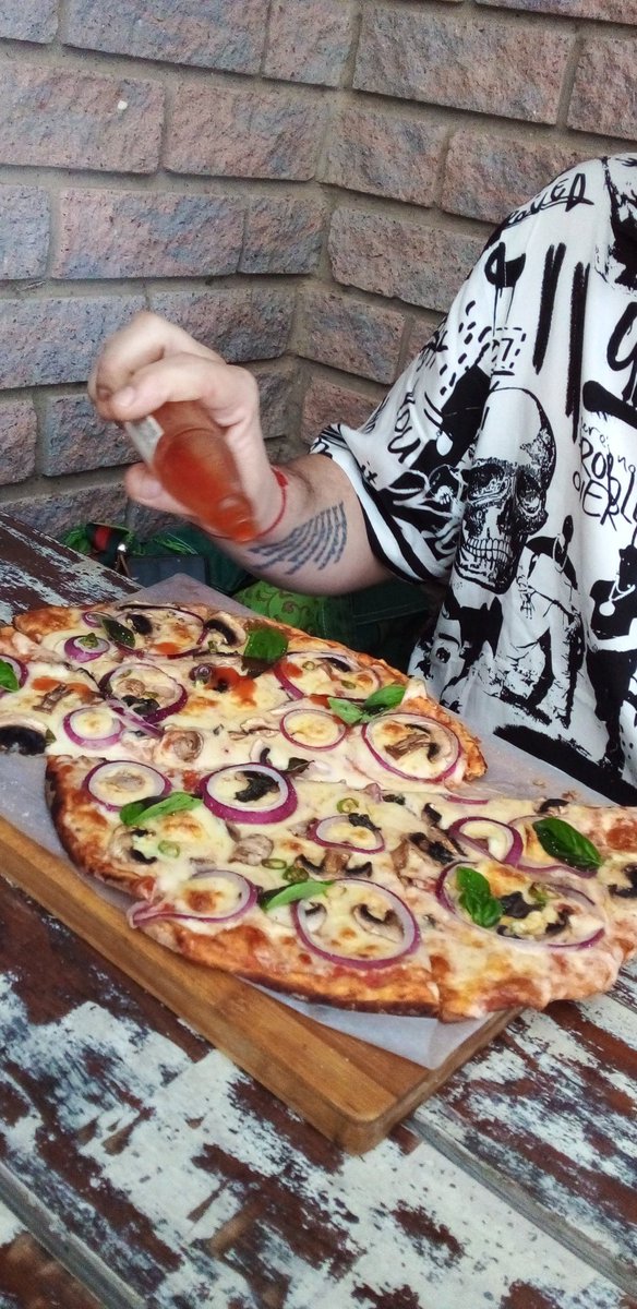 cheek2chic's tweet photo. Hot sauce on the pizza! #longweekend #lunch with a hurricane outside & #ginandtonic inside. "It's just drizzling"!! Watching the street lights sway drunkenly and the potplants smash into the wall #LMPrawns #Uvongo what a fab spot https://t.co/TgknchVOEL