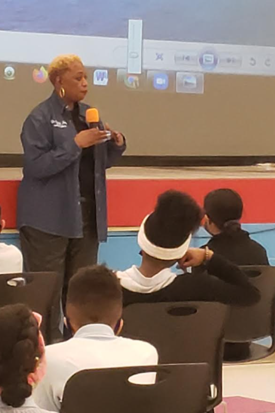 DrKSpells's tweet photo. Our Director of Teaching and Learning speaking to the students at the Jesse White Learning Academy about the importance of a great education.  Dr. Levy also spoke to our scholars about Women's History Month. https://t.co/d3kLc3BrbH