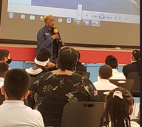 DrKSpells's tweet photo. Our Director of Teaching and Learning speaking to the students at the Jesse White Learning Academy about the importance of a great education.  Dr. Levy also spoke to our scholars about Women's History Month. https://t.co/d3kLc3BrbH