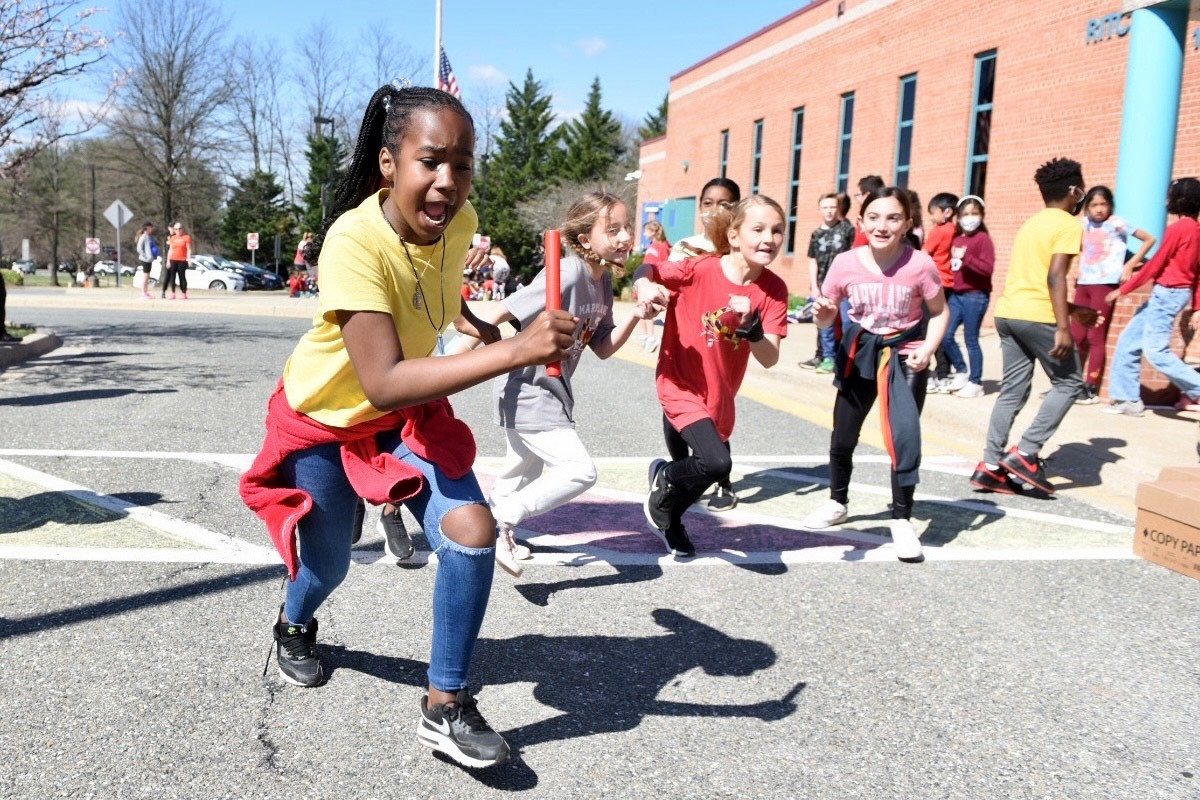 MCPS's tweet photo. Today Ritchie Park Elementary School celebrated Maryland Day. The school held a Metric Marathon, which included a student relay, staff/parent relay and a Richard Montgomery High School track team relay. @principalwinter https://t.co/mcLEodNodY