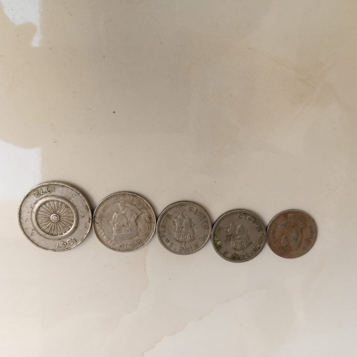 Coin is Indian coin rear coin and old coin 1947 and 1972 madel