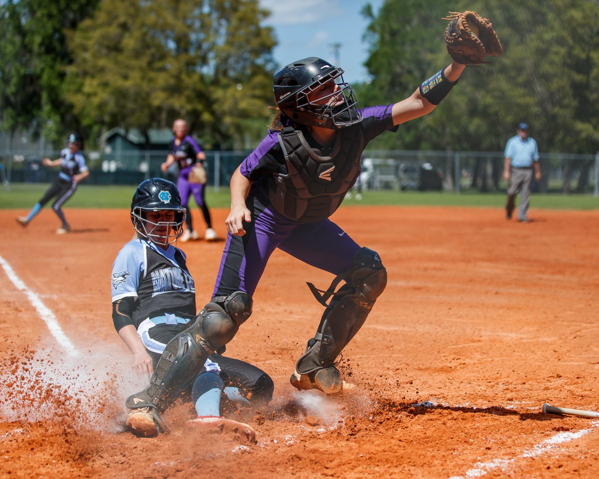 rrhsknights's tweet photo. Your @RRHSKnightsSB followed up a 12-11 win over NC with a 13-0 win over Crystal River to go 2-0 on day 1 of Leopard Slam. A few images from game 1 - Sophie Johnson congrats by Coach Goluba after HR1, a force out at home, a celebration behind coach Blankenship, and the final out https://t.co/SajJTtiNHX