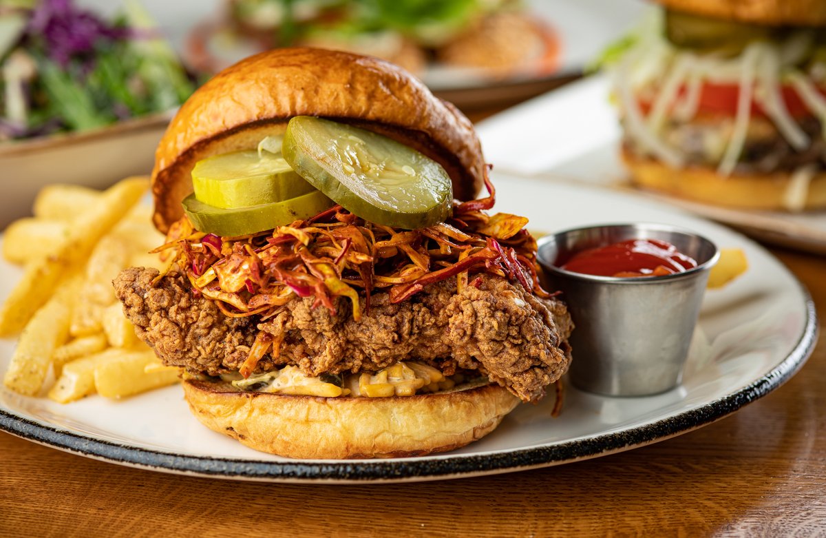 It's officially Restaurant Week! Try our fried chicken sandwich with pimento cheese, pickles, cabbage slaw, and spicy puya chili vinaigrette on on our Lunch Menu.