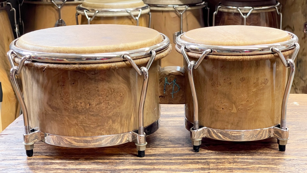 manitoperc's tweet photo. Maple burl solid shell bongos from the same sustainably harvested log. These are part of Ryan's personal collection. #solidshell https://t.co/iO0jQPxnit