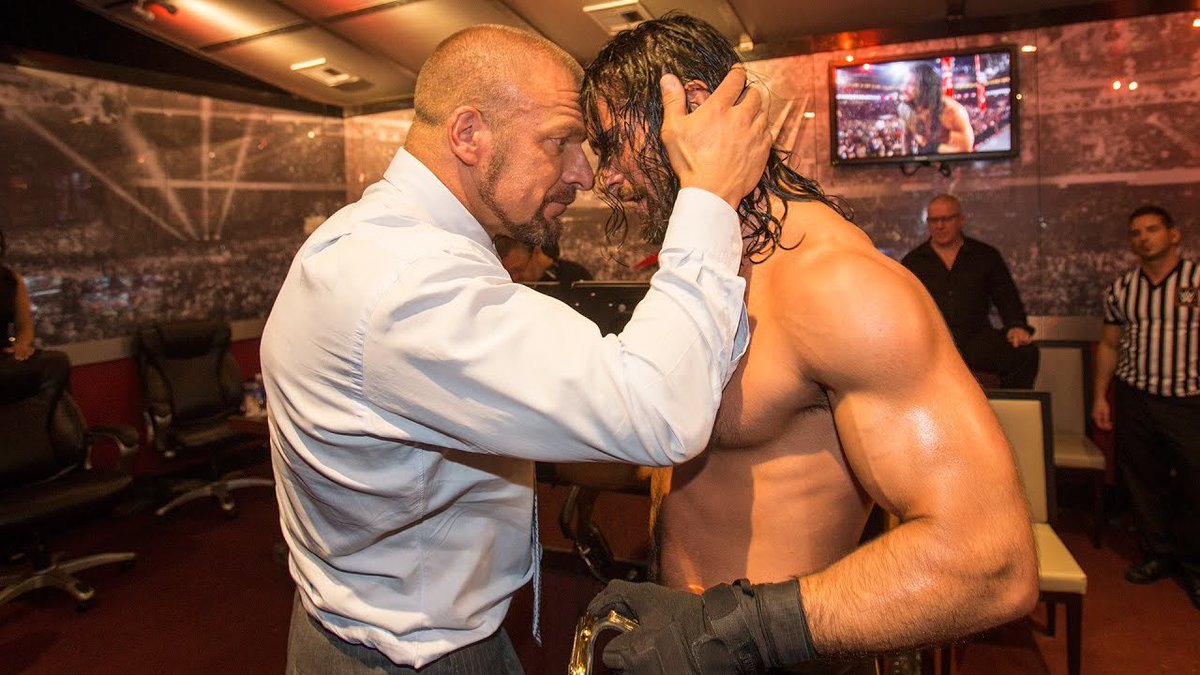 WrestleFeatures's tweet photo. One of my favourite 📸 of all time. @TripleH embracing @WWERollins after Rollins won the WWE Title at Mania 31. https://t.co/HkC06hAbfJ