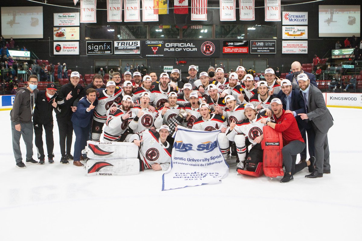 UNBAthletics's tweet photo. 🔴⚪️⚫️You had to know this was coming.⚫️⚪️🔴

@UNBWHockey and @UNBMHockey celebrate 2021-2022 @AUS_SUA titles.

A historic hockey season at @UNB @UNBFredericton 
#goredsgo https://t.co/qRZc1Aw2jQ