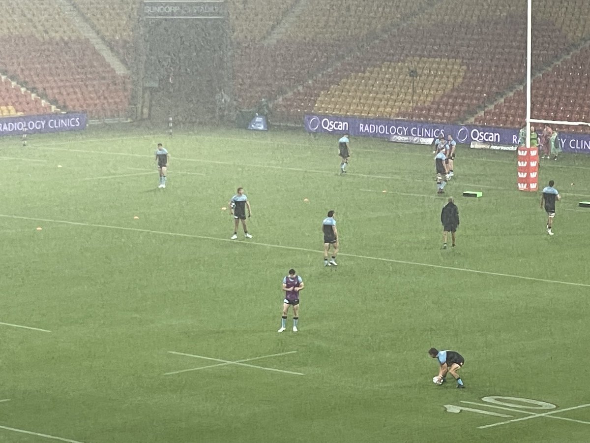 Watching #Warratahs warm up in the pouring rain at #SuncorpStadium for the game against #Reds. Hope the weather clears !