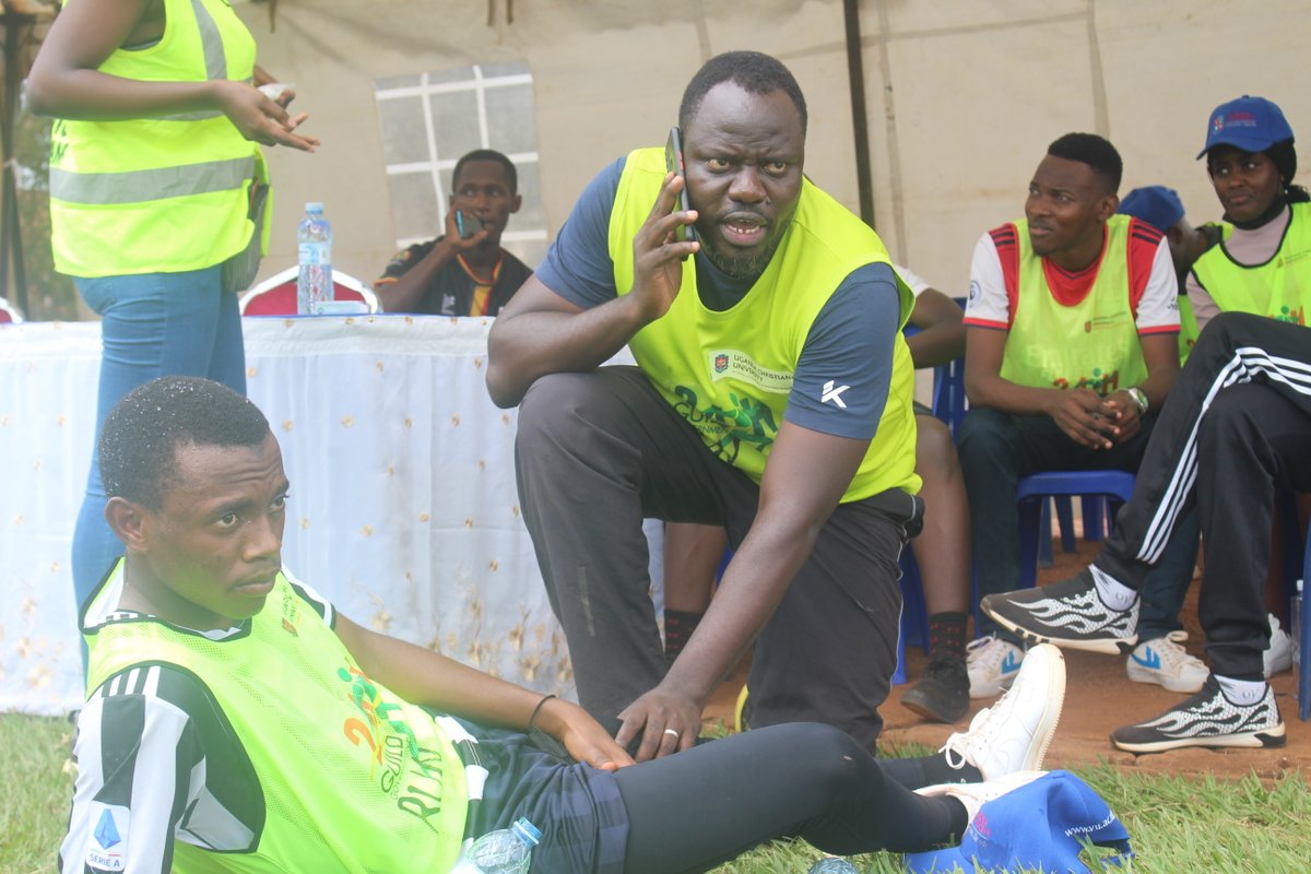 UCUniversity's tweet photo. UCU Sports Administrator @lukasfnz offers first aid to one of the marathoners.
#ucuguildrun https://t.co/u9Bx43yNqp