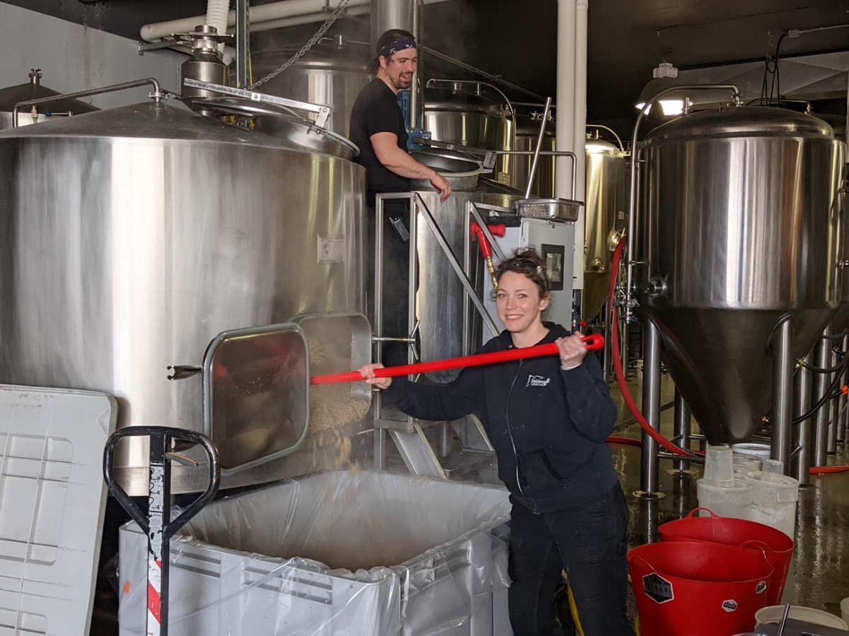 At <a href="/stoupbrewing/">Stoup Brewing</a> the brewers emptied the mash tun. We tasted a bit of the mash. Kind of like a warm oatmeal. They also showed us some of the hop pellets. PRO TIP: Unless you really, really want to know what bitter tastes like, just smell the hops, don't put them in your mouth.