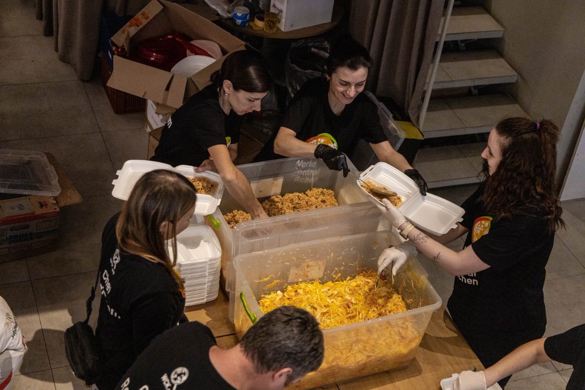 In Lviv, WCK partner Pasta Cafe makes 4,000 meals a day with their 3 restaurants combined—a joint effort! Their plating area is full of food donations &amp; volunteers from the city. 

Following the missile attacks in Lviv today, all our team &amp; partners are safe. #ChefsForUkraine