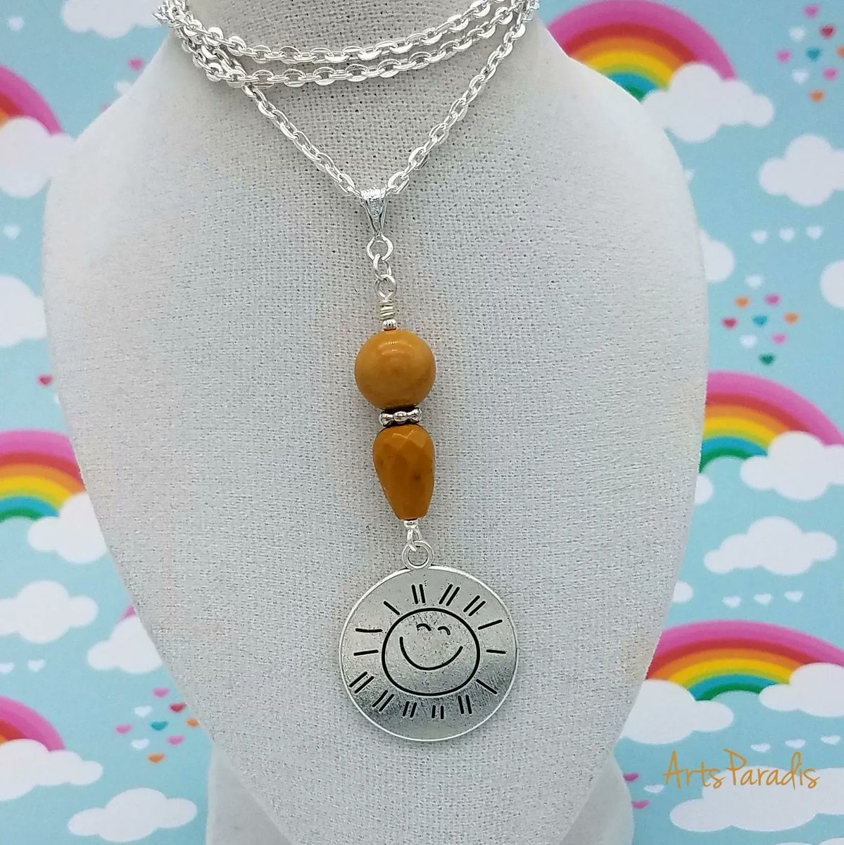 Spring is finally getting here. Which means summer is coming right behind! And summer sunshine is always a welcome addition to any day!  ArtsParadis.com #handmadejewelry #womanowned #LGBTQowned #proudartist #youaremysunshine #summerlook