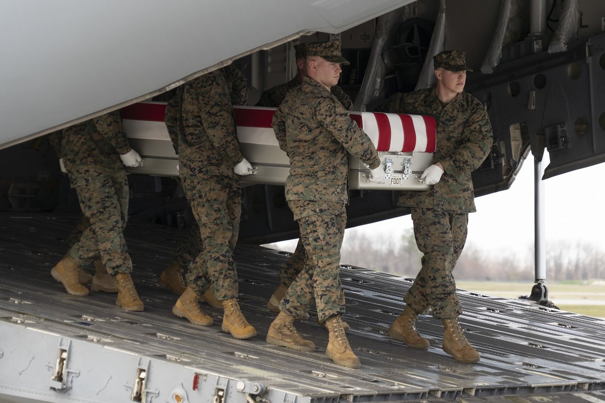 wrtv's tweet photo. A dignified transfer was conducted Friday for Marine Corps Capt. Matthew J. Tomkiewicz of Allen, Indiana.

It is a solemn movement of the transfer casket by a carry team composed of military personnel from the fallen member's respective service. 

📷 Air Force photo/Jason Minto https://t.co/arhRU1cmf5