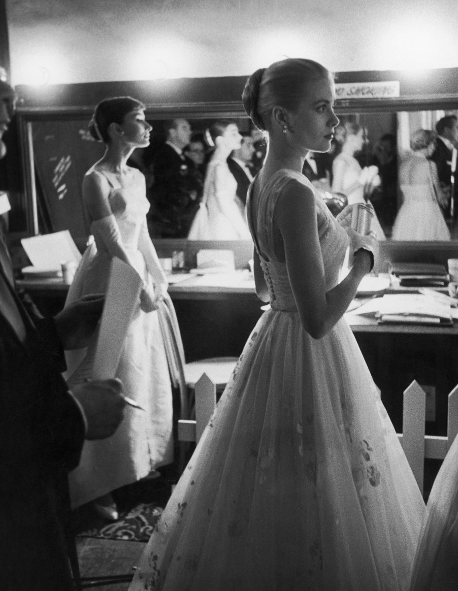 hepburnfiles's tweet photo. audrey hepburn and grace kelly photographed backstage at the 28th academy awards on march 21, 1956

#oscars https://t.co/tIblLKzu2u