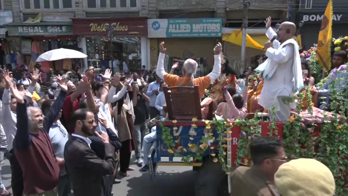 ANI's tweet photo. J&amp;K | ISKCON organized 'Shobha Yatra' from Sri Kathleshwar temple to Jehangir Chowk in Srinagar on the occasion of Ram Navami https://t.co/hKqKsfpFya
