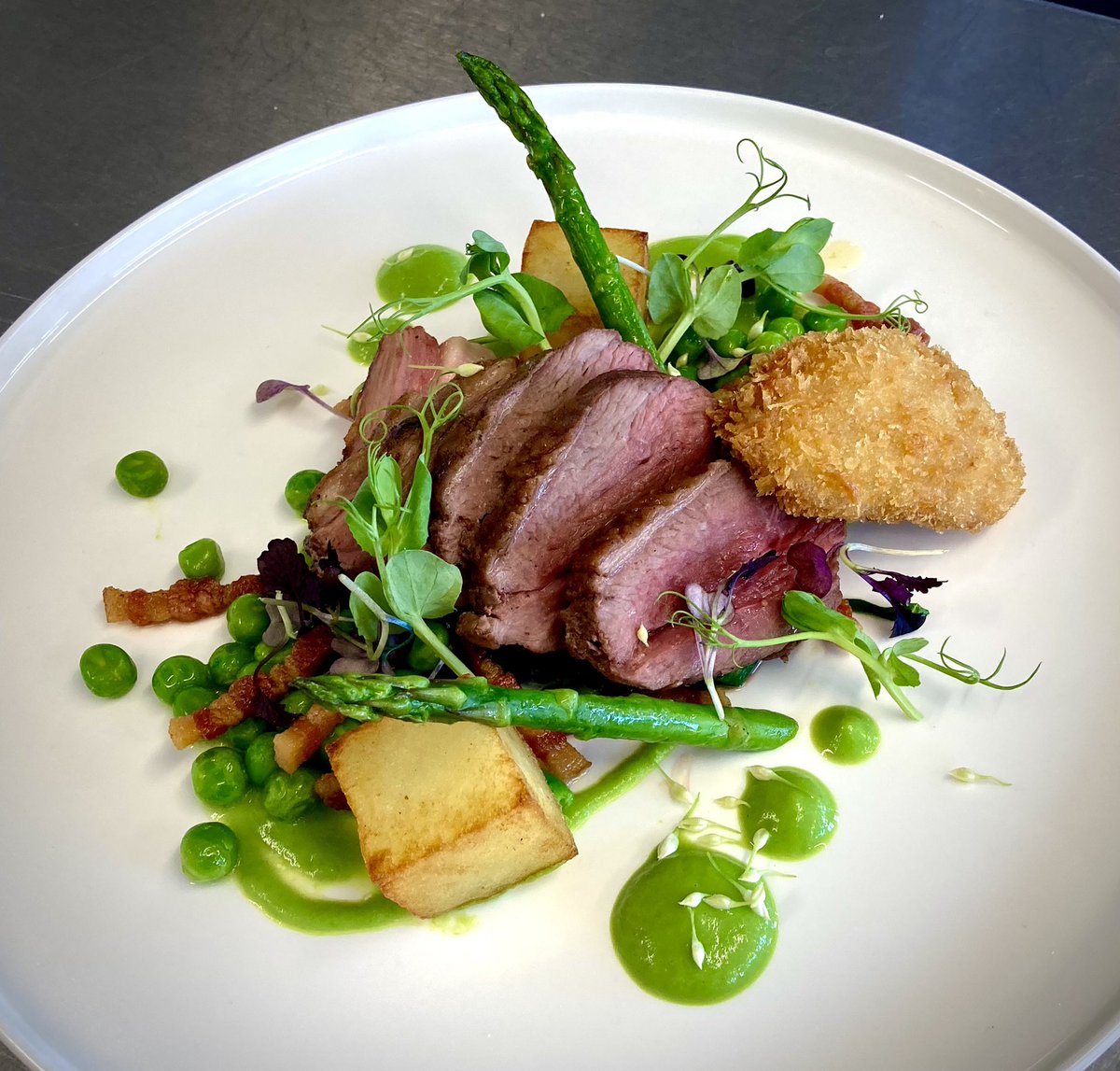 HopwoodChef's tweet photo. Our level 3 learners embracing spring with this fabulous looking chump of lamb dish with crispy sweetbreads, asparagus, peas &amp; parmentier potatoes @hopwoodhall #spring #lamb https://t.co/auCHyYGfu3