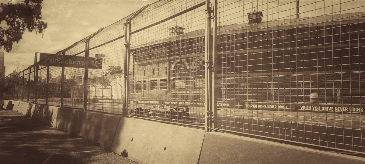 Jess4Realestate's tweet photo. I felt a little #nostalgic at the #AusGP today. Capturing the Ferrari in front of the @VicInstSport historical building. #welcomebackmelbourne https://t.co/cCwH1BhTU5